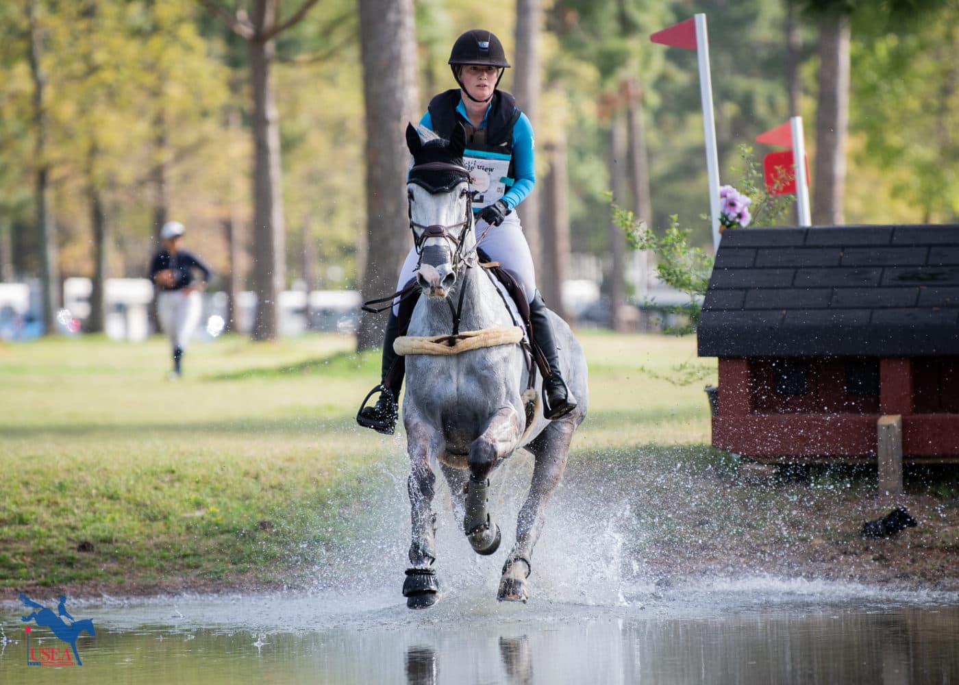 Ivie Cullen-Dean and Fernhill Cardevega splashed through the water in the CCI3*-S. USEA/Lindsay Berreth photo