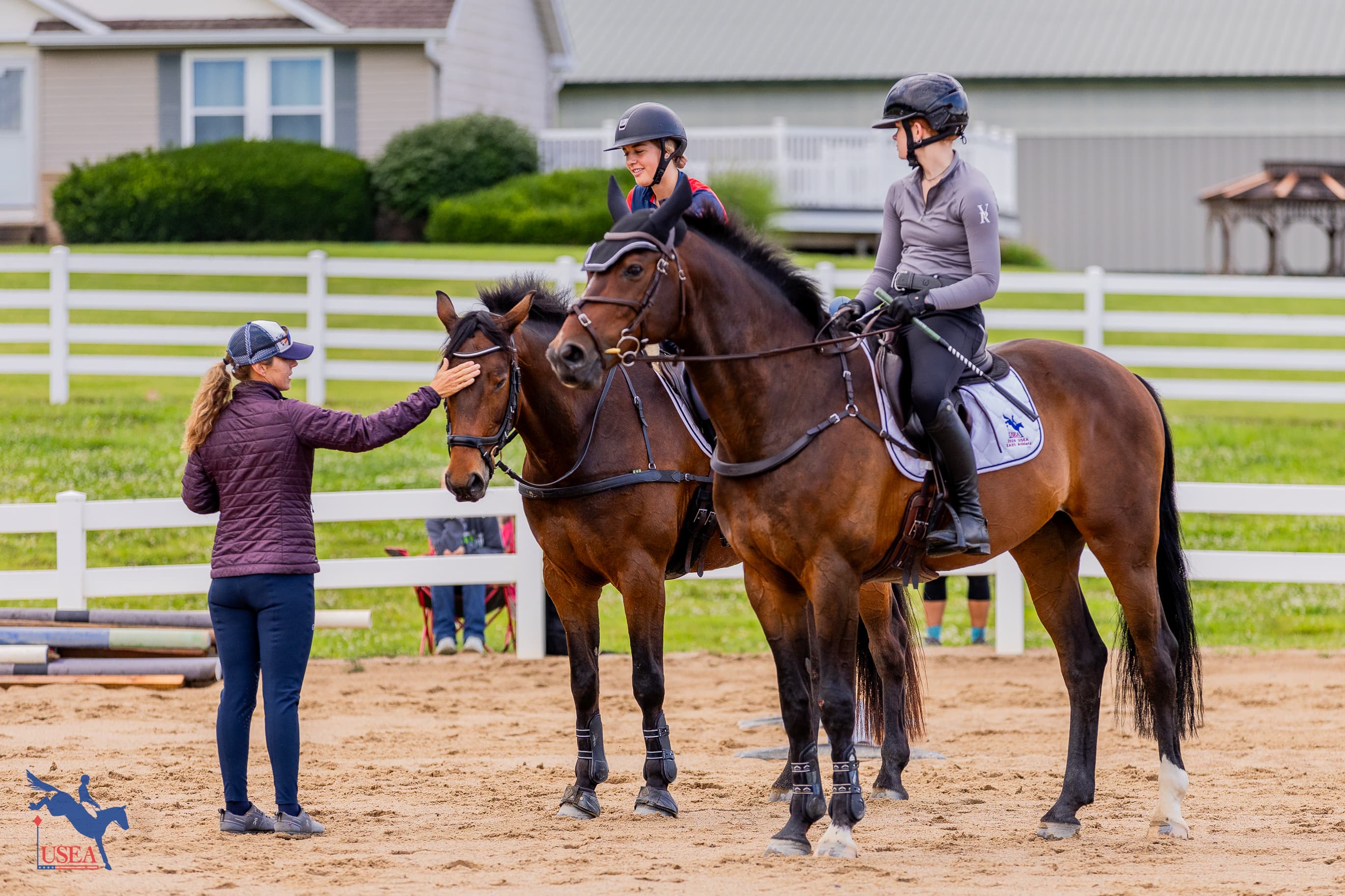 Shaena Putnam and Willow Schwartz with coach Shannon Lilley. USEA/Haley Johnson photo
